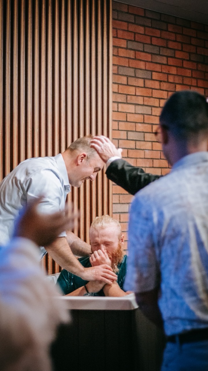 A baptism at the tank