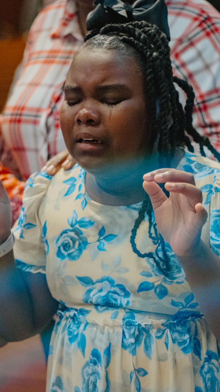 A young girl praying