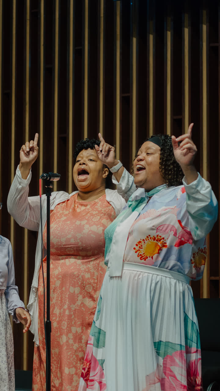 Three women singing