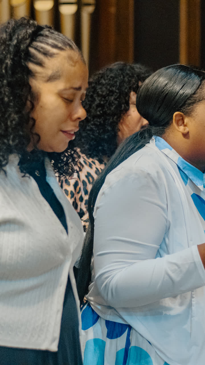 Women praying together